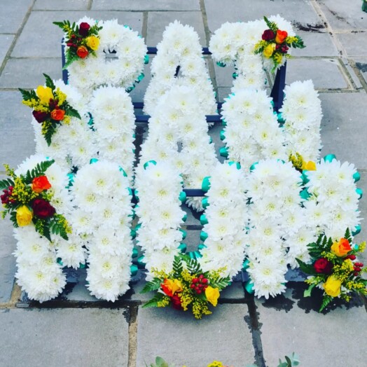 Floral Letters Funeral Tribute, We understand the significance of the floral tribute for your loved one. Get in touch to discuss your requirements.